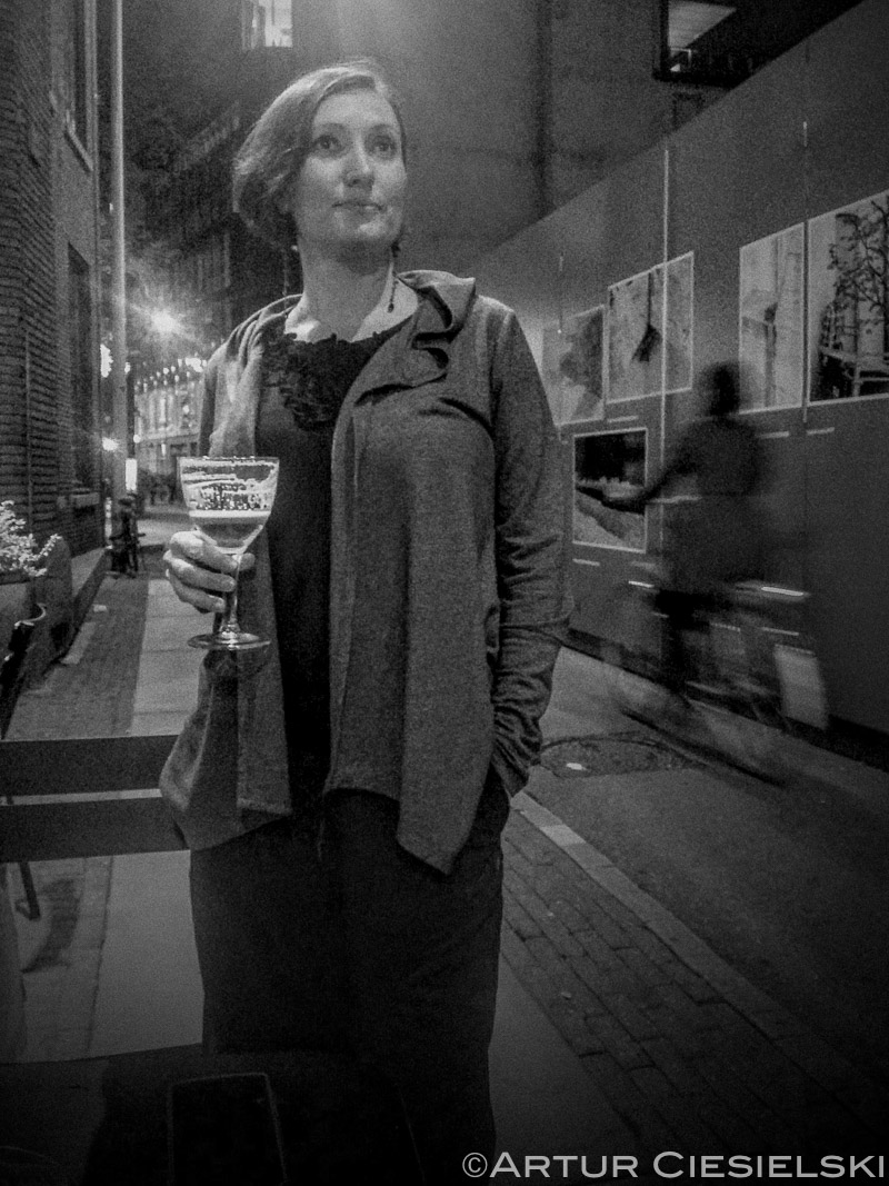 Waiting for a table outside with a beer. It was about 16 degrees C.
