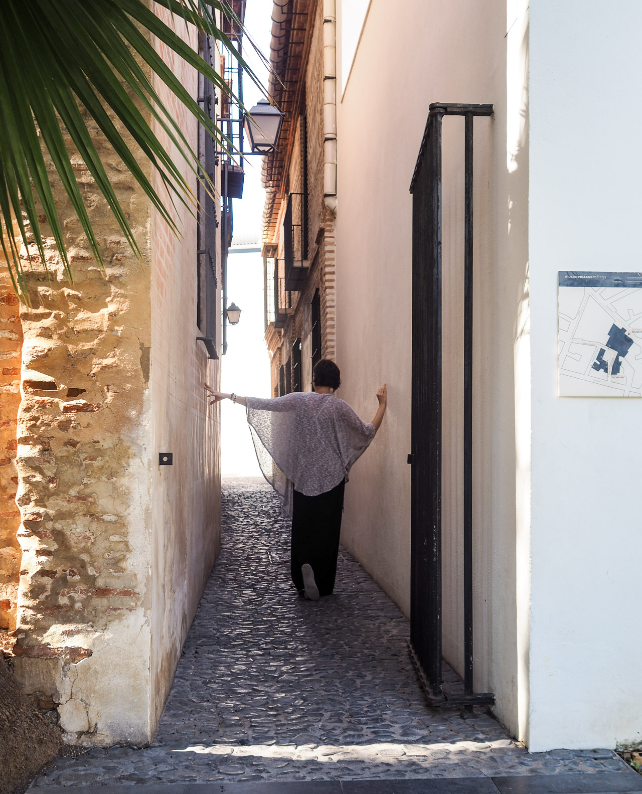 walking a narrow street